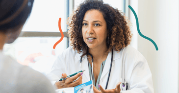 Doctor explaining medical information with patient