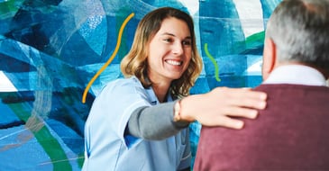 Doctor smiling at patient